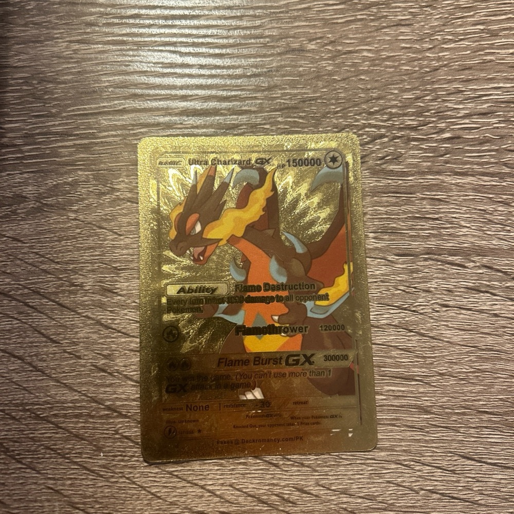 Gold Charizard GX Card